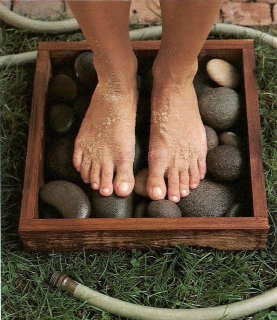 17. Rinse your dirty feet off in a waterproof frame filled with flat stones. -   32 Cheap And Easy Backyard Ideas