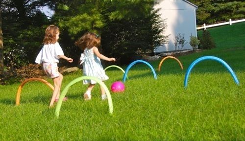 26. Set up pool noodles for a game of kickball croquet. -   32 Cheap And Easy Backyard Ideas