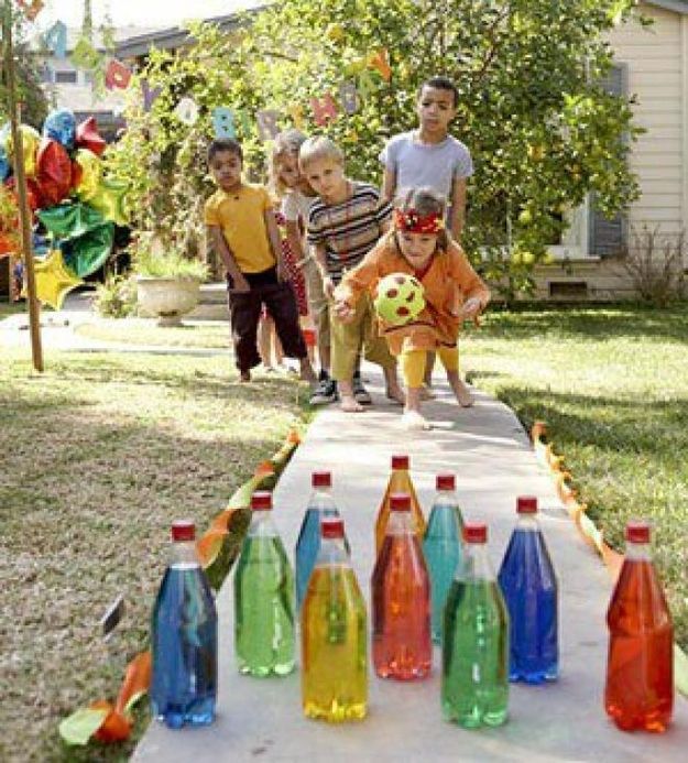 7. Break glow sticks into bottles of water for some nighttime lawn bowling action. -   32 Cheap And Easy Backyard Ideas