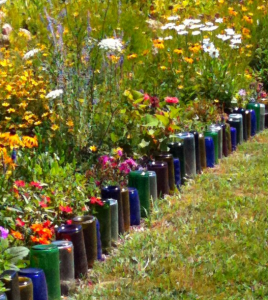 glass bottle garden edging: as much as I love this, it would only take that one