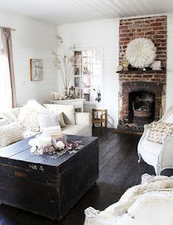 love that wooden chest, love the whites against the dark floor and chest