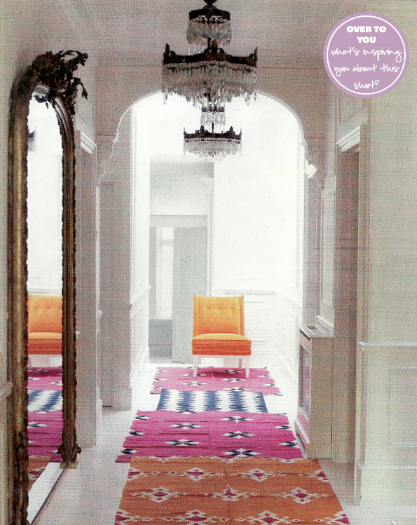 multiple rugs down a narrow hallway (via Red mag)