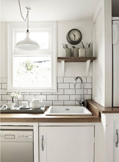 nice alternative for utensil drawer.  also love the subway tile with dark grout