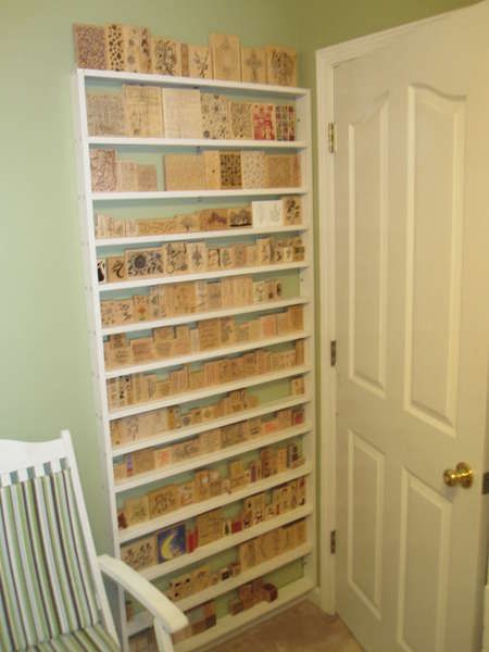 storing stamps behind a door on simple shallow strip shelving. Brilliant use of