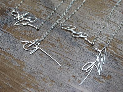 Have your or someone you love's signature made into a necklace. This is pret