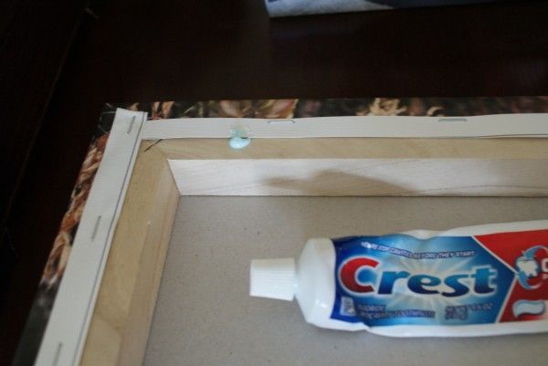 OMG… GENIUS!  When hanging a picture, put toothpaste on the frame where the na