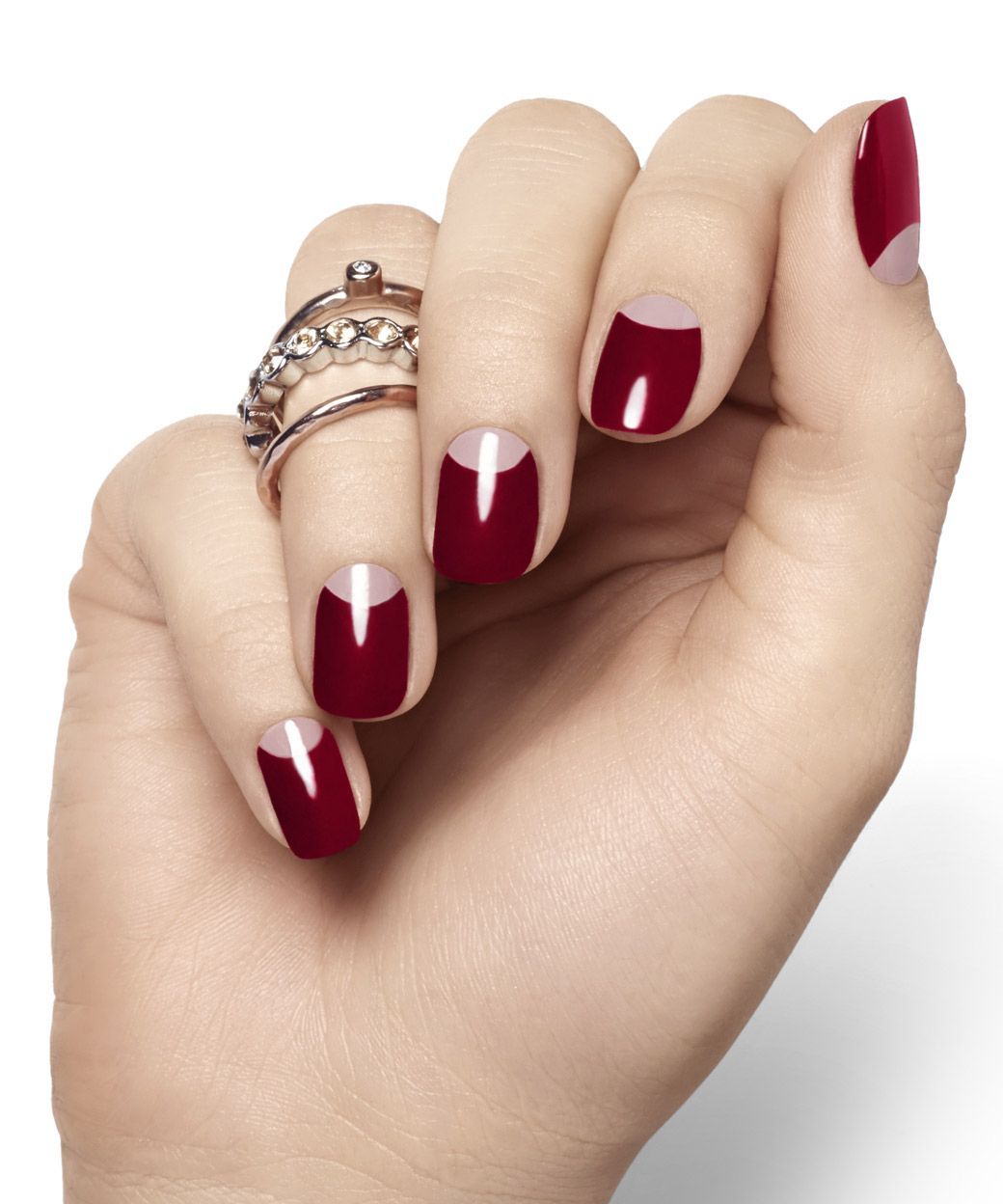 Pairing an elegant soft mauve with a deep red wine for a half-moon mani.