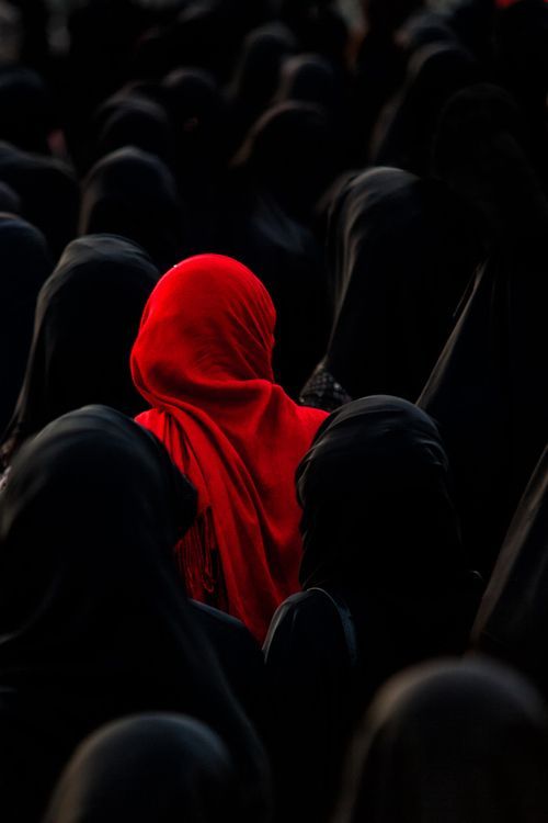 alone in a crowd, red veil