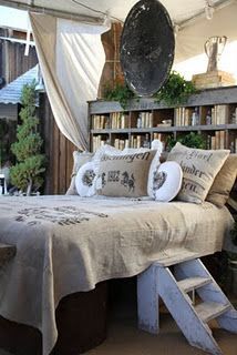 bookcase headboard – love this look! How I wish my husband would go for it.