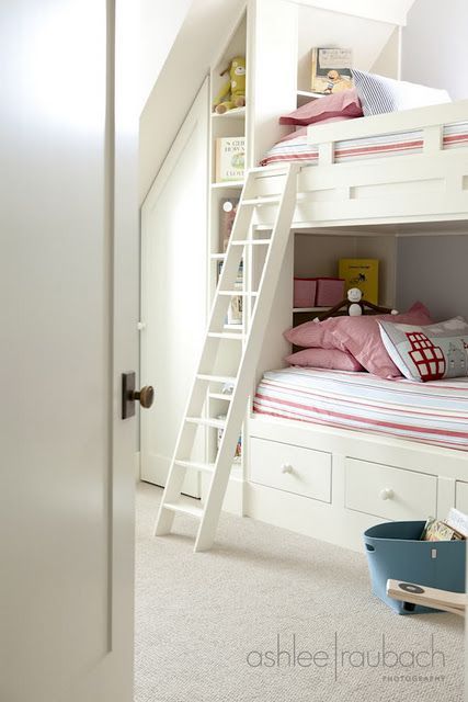 bunk beds and storage built-in to the knee wall