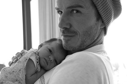 can't get any better than David Beckham holding his baby daughter.