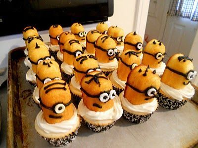 Despicable Me Cupcakes–Easy Minions made with half a Twinkie, some black frosti
