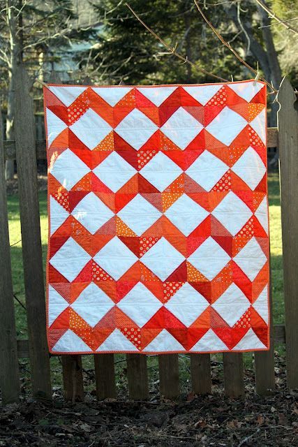 I love orange!  Simple quilt made with half-square triangles.