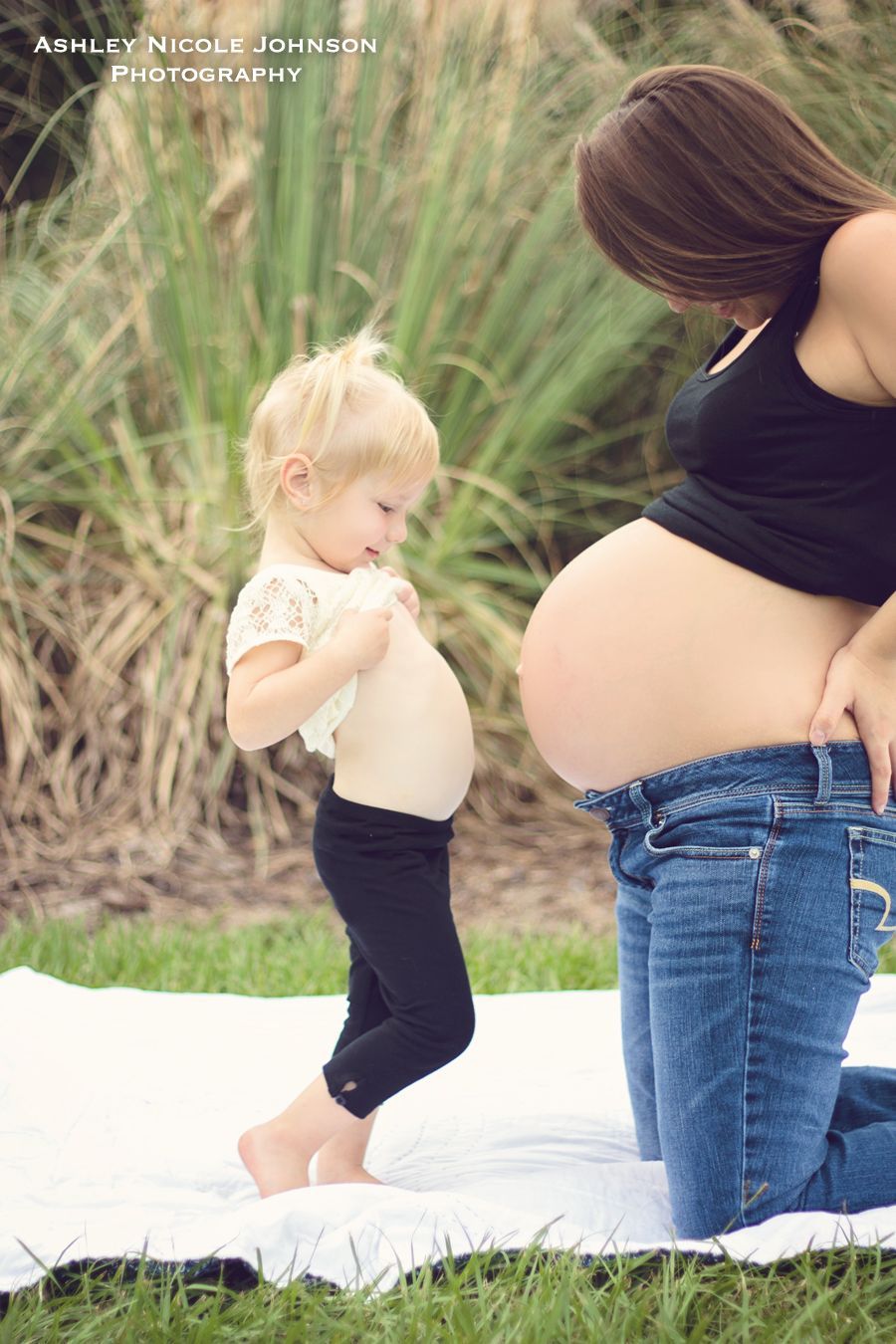 love this…so sweet! H does this all the time for belly button comparisons :)