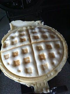 Pizza (calzone style?) in a waffle iron! This site gives a recipe for Pizza Hut