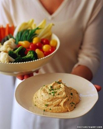 Roasted-Garlic Hummus…has lots of other Martha Stewart recipes too! Easily cat