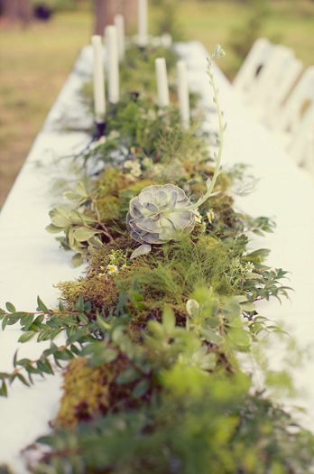 Rustic greenery and wildflower centerpiece.   Photo by Sarah Kate Photographer.