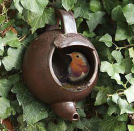 Teapot bird nester, recycle, upcycle, repurpose. drill small hole, affix to boar