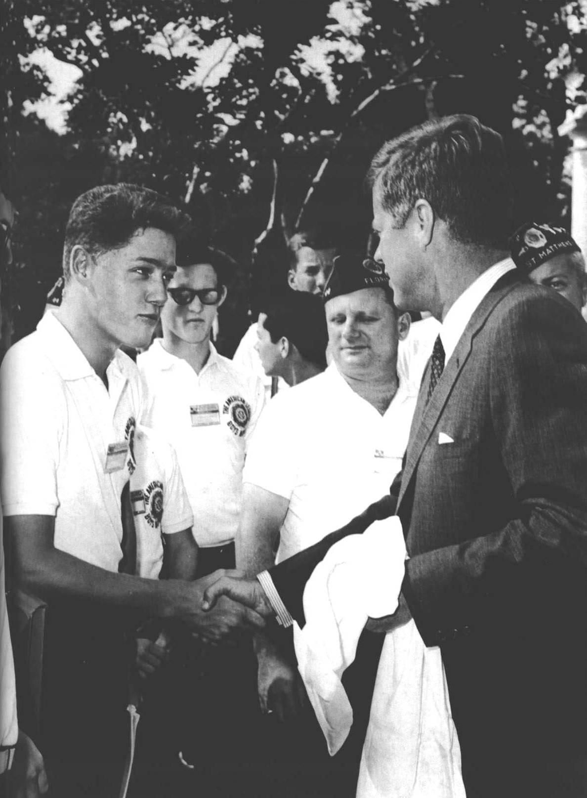 A future President meets a President.  Bill Clinton and JFK.
