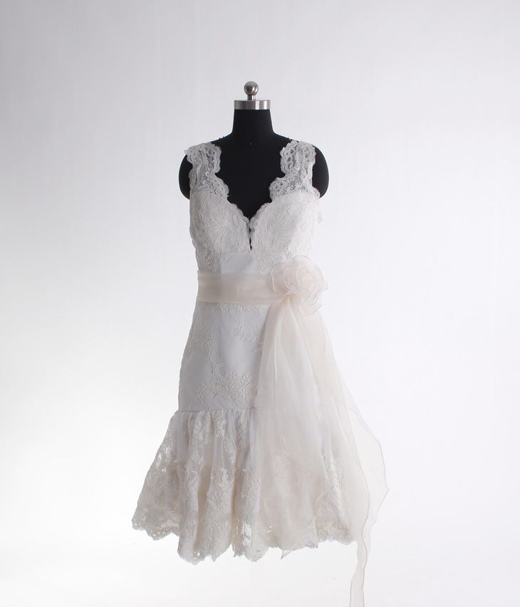 A-line sleeveless lace knee-length bridal gown…Im surprised how much I love th