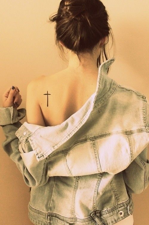 Back shoulder cross tattoo–placement higher; size, thickness, and ratio good