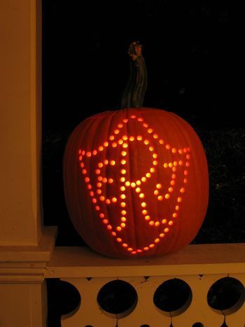 Carved Pumpkins from Eddie Ross–Monogram  ((Made with a drill!  S.))