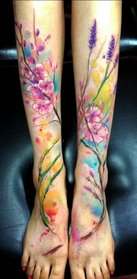 cherry blossoms and lavender with colorful background- love this style of tattoo