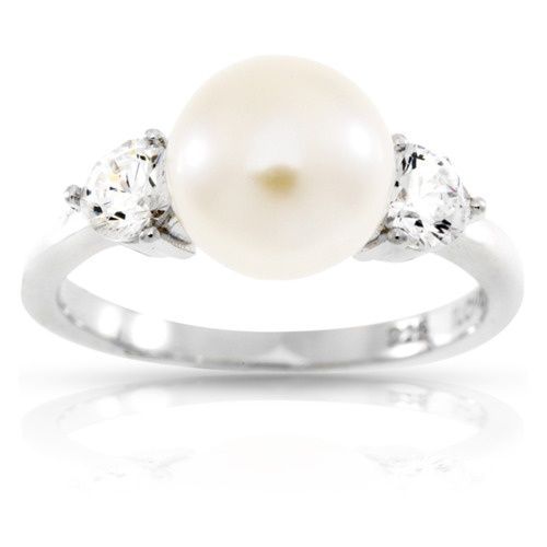 Classy Pearl Engagement Rings id love this with dome filigree on the sides.. and