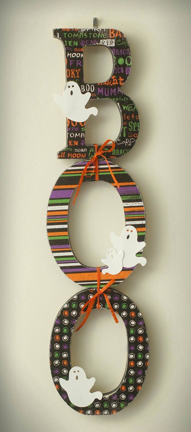 Cute BOO sign made with wood letters, scrapbook paper, and embellishments.  Love