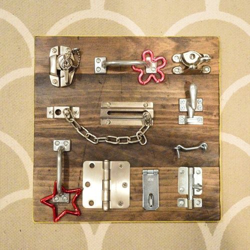 diy latch board, perfect for a busy inquisitive toddler