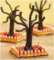 Edible Halloween Craft Graham crackers, melted chocolate, candy corns, candy pum