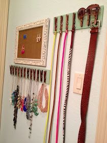 Glue some clothespins or use screw hooks on a strip of wood for a creative way t