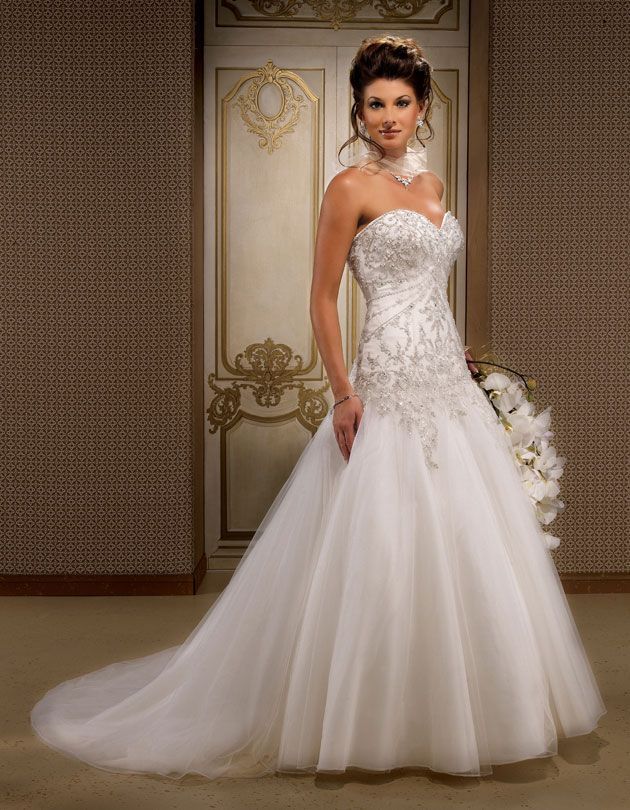 Gorgeous sleeveless ball gown floor-length wedding dress.