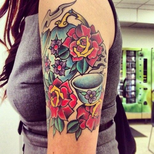 I just love colorful, girly, quarter-sleeve like tattoos on women.