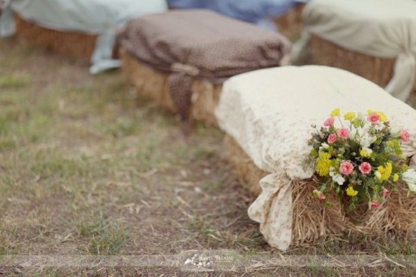 I like adding fabric covers to the hay bale seating.  Much more comfortable and