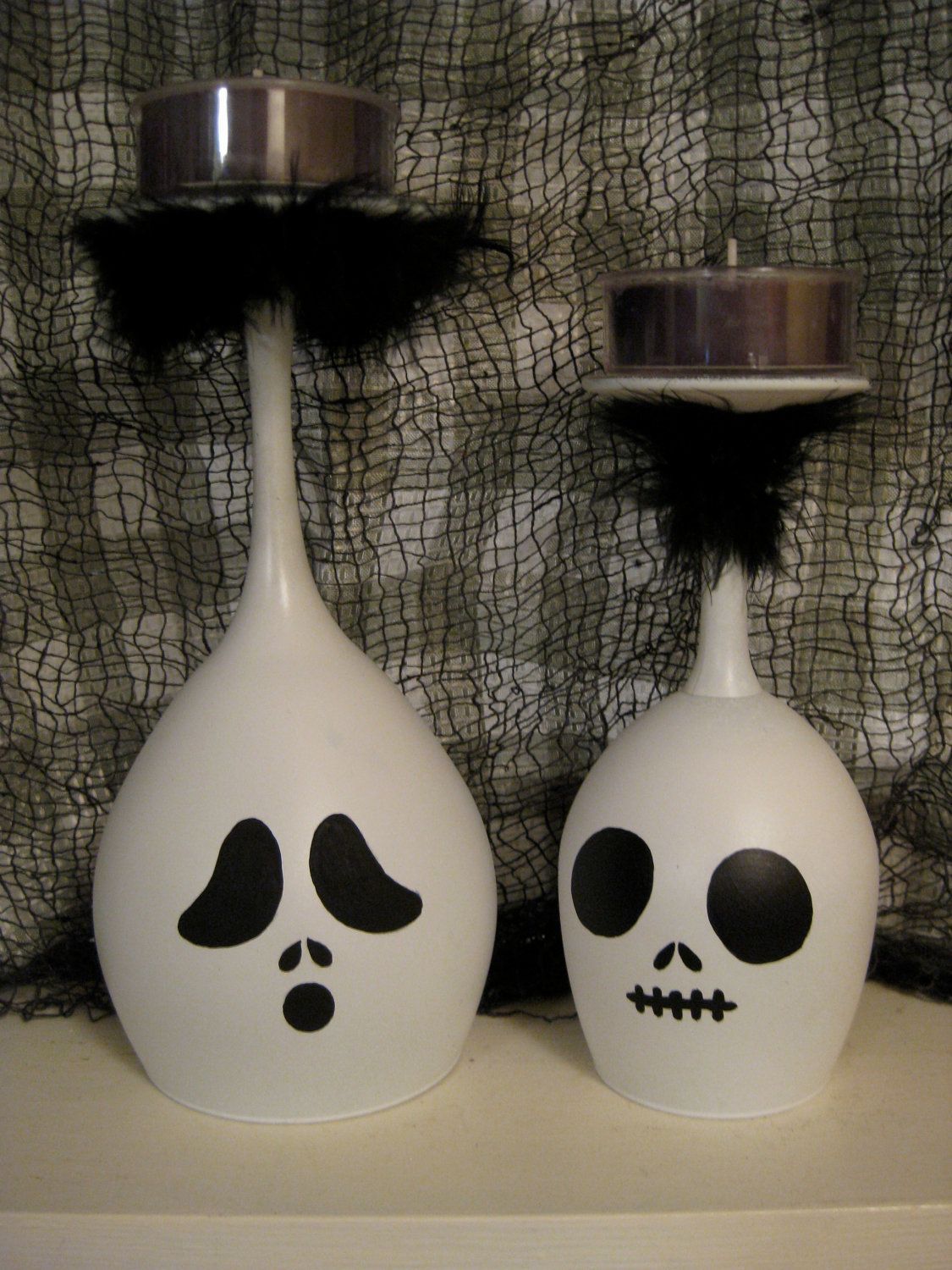 Make them yourself candle holders.. white and black paint (able to hold on to gl