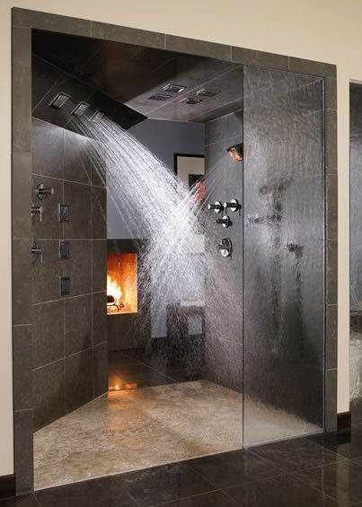 Multiple shower heads and a fireplace? Yes, please