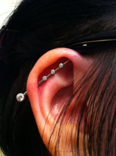 Pretty industrial piercing I did today at the shop. Jewelry from Anatometal. All