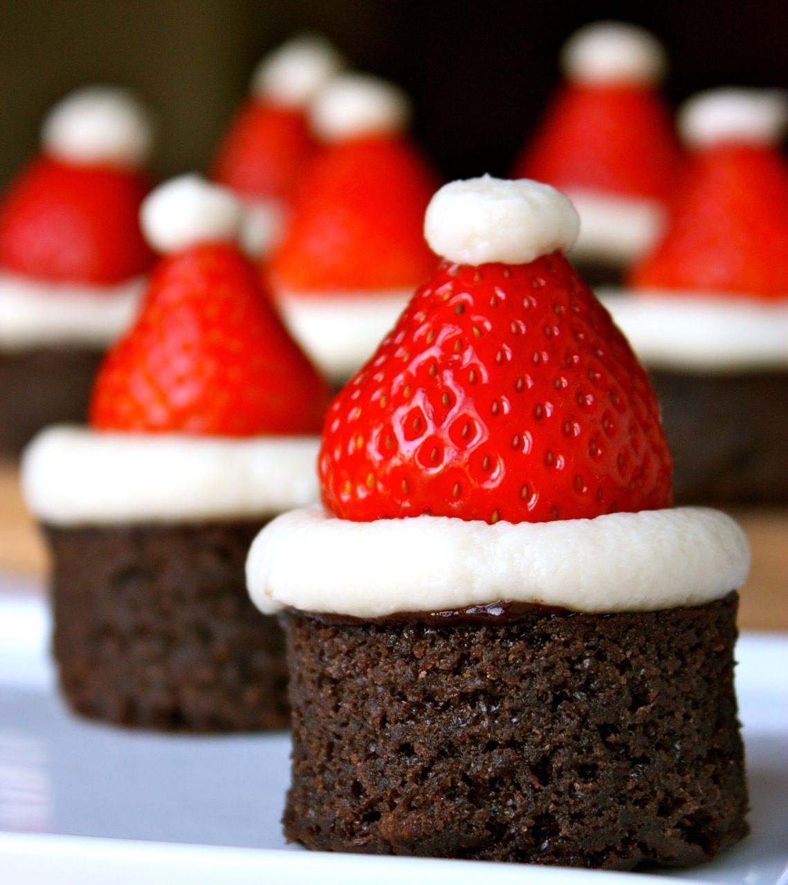 Santa hat brownie bites – I MUST remember this at Christmas time!!