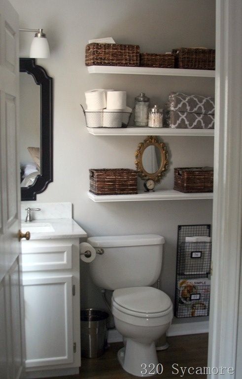 Small bathroom solution: Buy shelving for above the toilet and use pretty boxes/