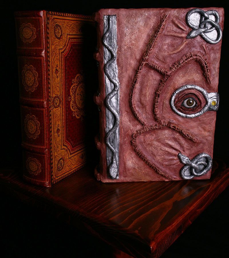 To make this Hocus Pocus inspired spell-book, I took a hollowed-out book from a