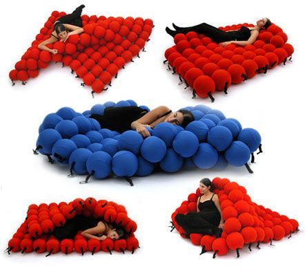 Wait… is this real life? This unique bed is made from 120 medium sized sofa ba