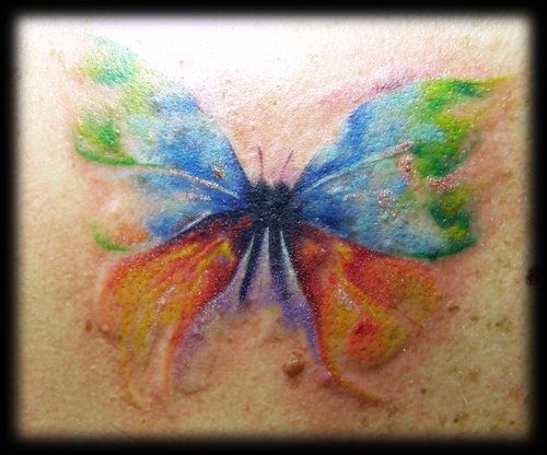 watercolor butterfly tattoo..love the water colors idea!