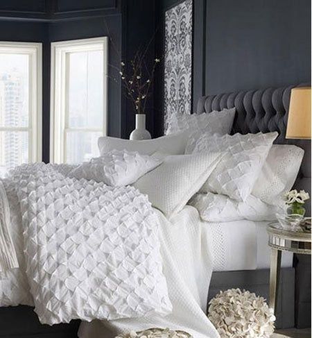 White comforters are the most inviting. All you want to do is jump into that clo