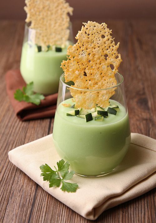 Chilled avacado and cucumber soup served with a light and airy parmesan cheese c