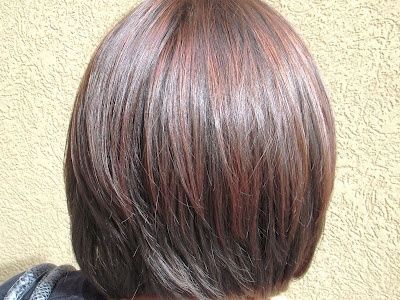 Copper highlights on dark brown hair