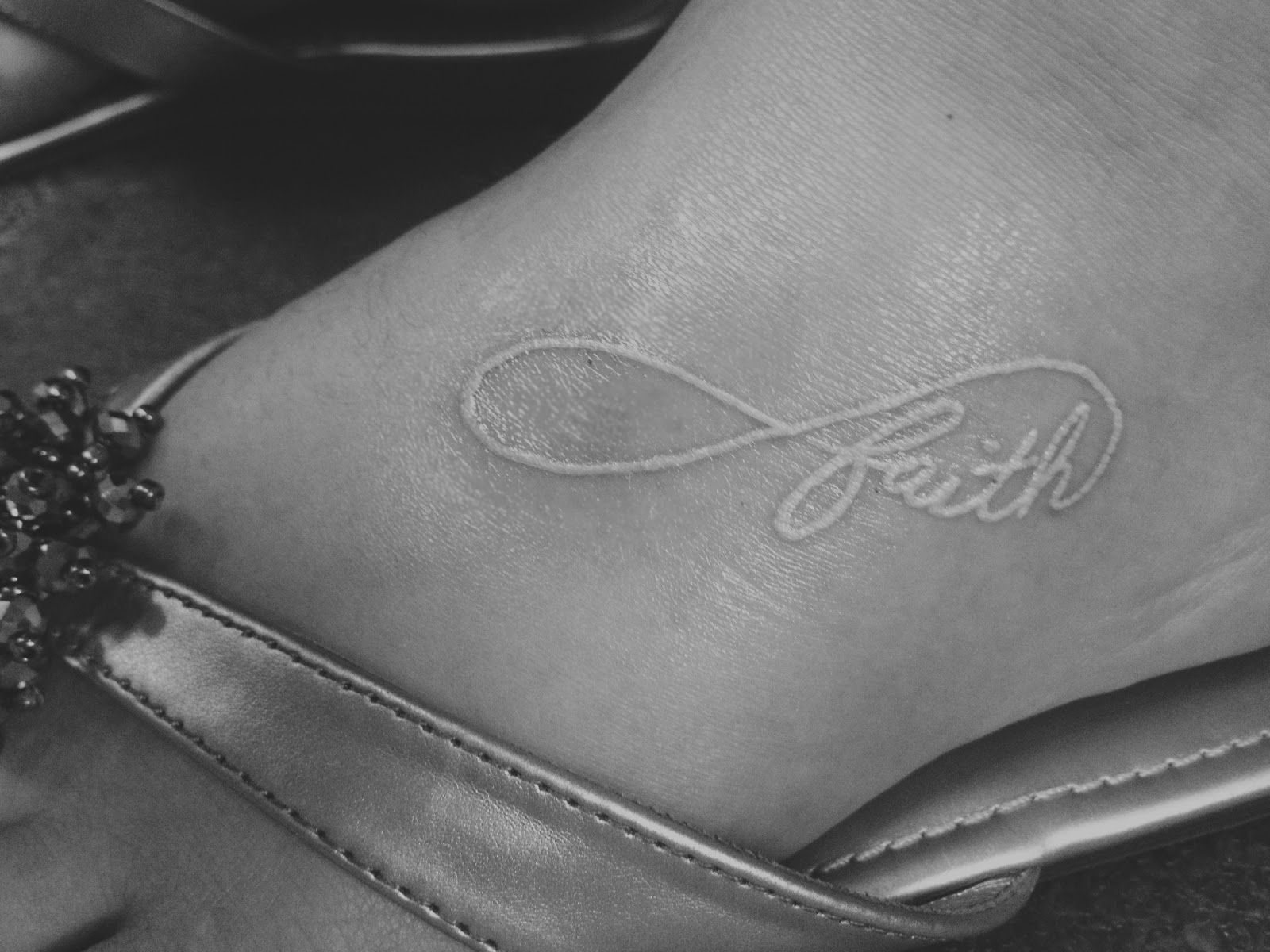 Faith tattoo.
