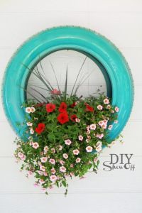 How-To: Recycled Tire Flower Planter   * could hang it on the fence to brake up
