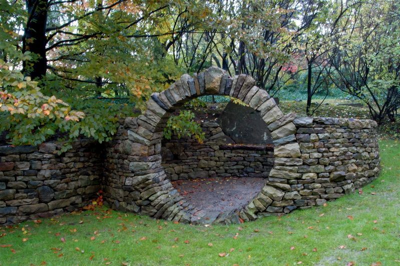 moon gate entrance into a secret walled outdoor room