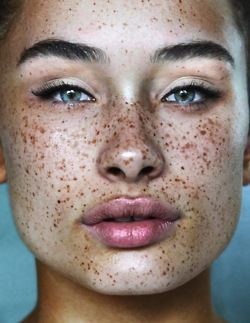 The freckles, the eyes, the lips. She is stunning!